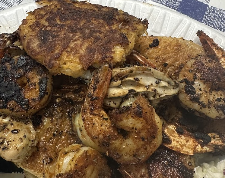 The Sea Shack signature dishes Fish & Shrimp DinnerCrab Cake PlatterGrouper Sandwich